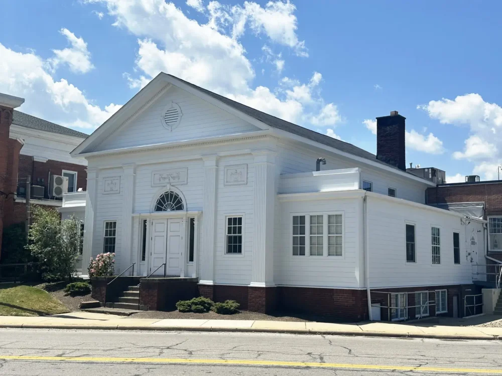 Replaced siding and new gutters for the Courthouse in Painesville by Biltmore Exteriors