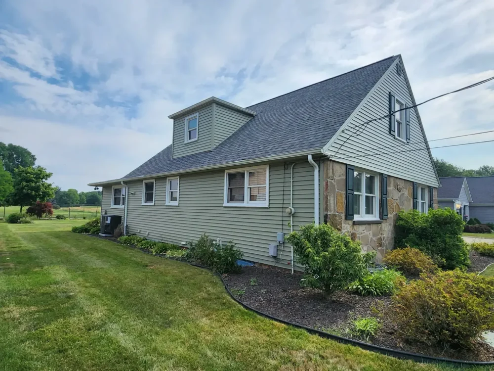 Roof, siding, gutters and shutters by Biltmore Exteriors