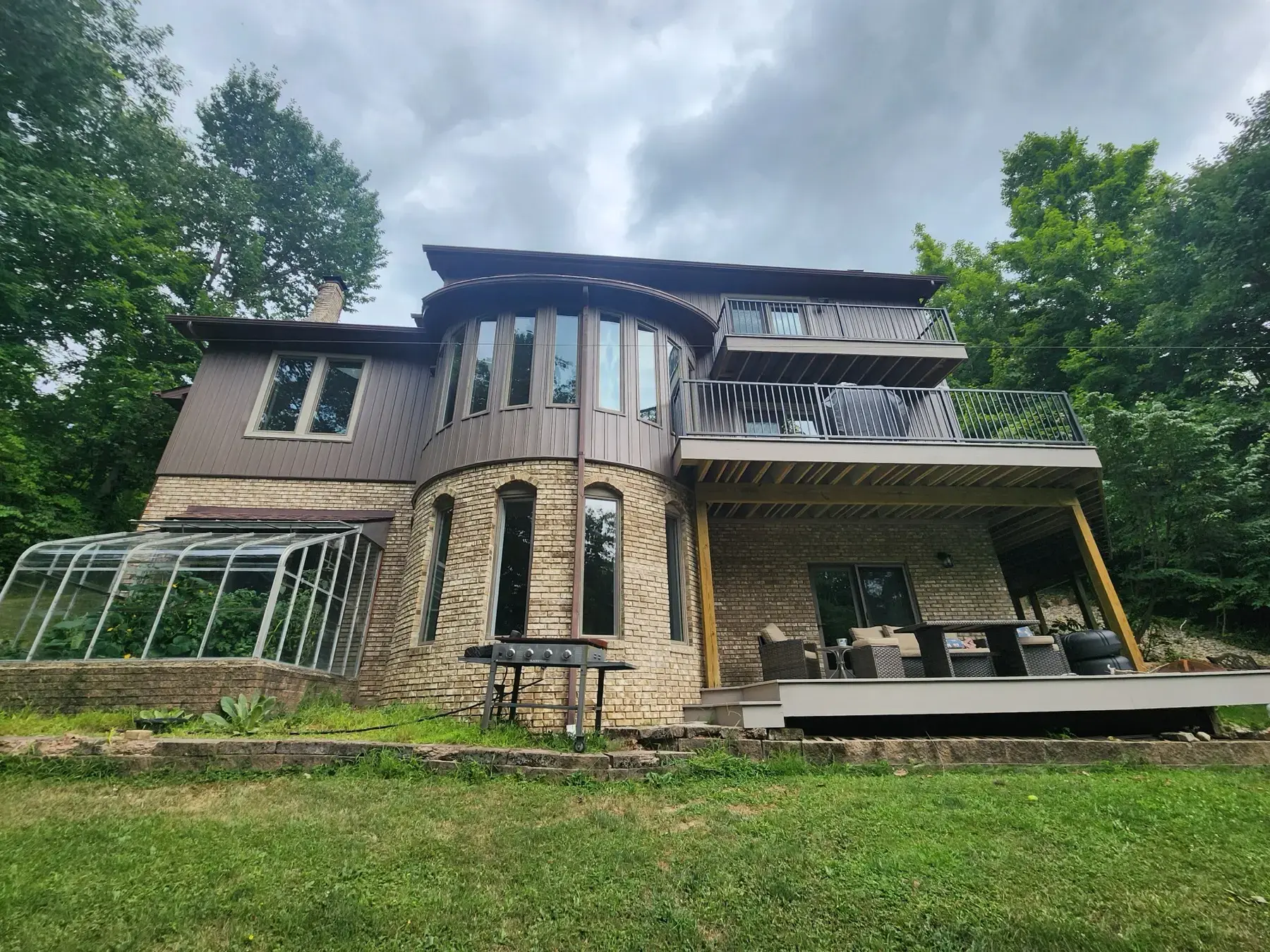 New board & batten siding and other exterior upgrades in Painesville by Biltmore Exteriors