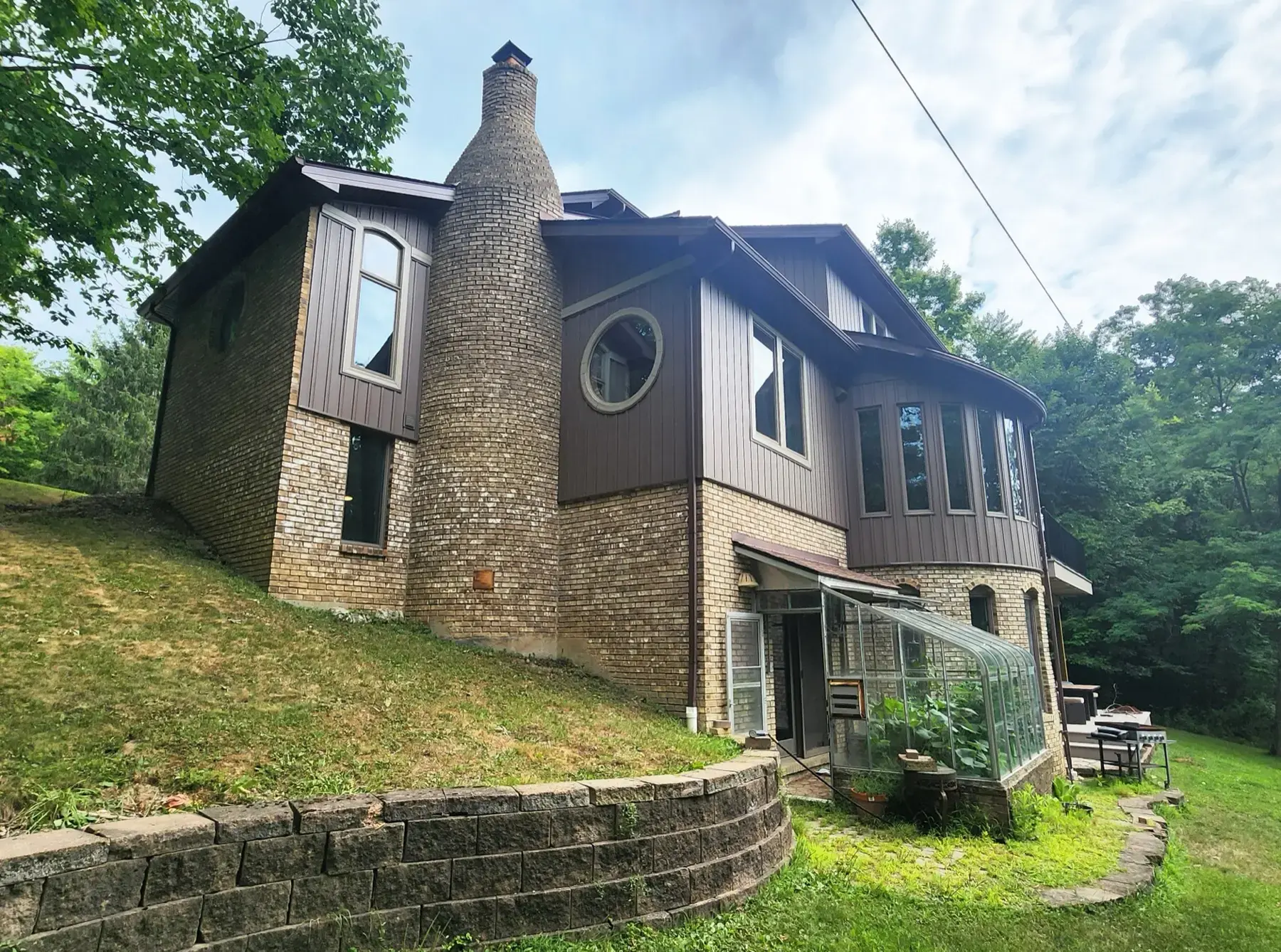 New board & batten siding and other exterior upgrades in Painesville by Biltmore Exteriors