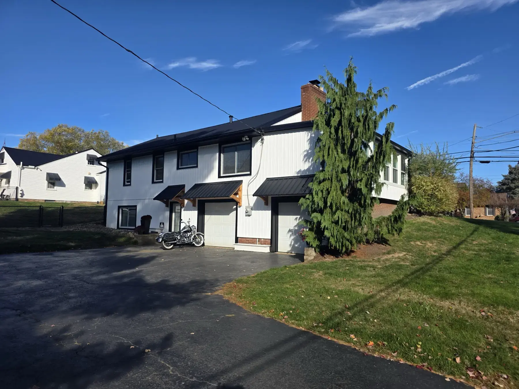 Metal roofing, siding, gutters, soffit, garage door seals, and more exterior work
