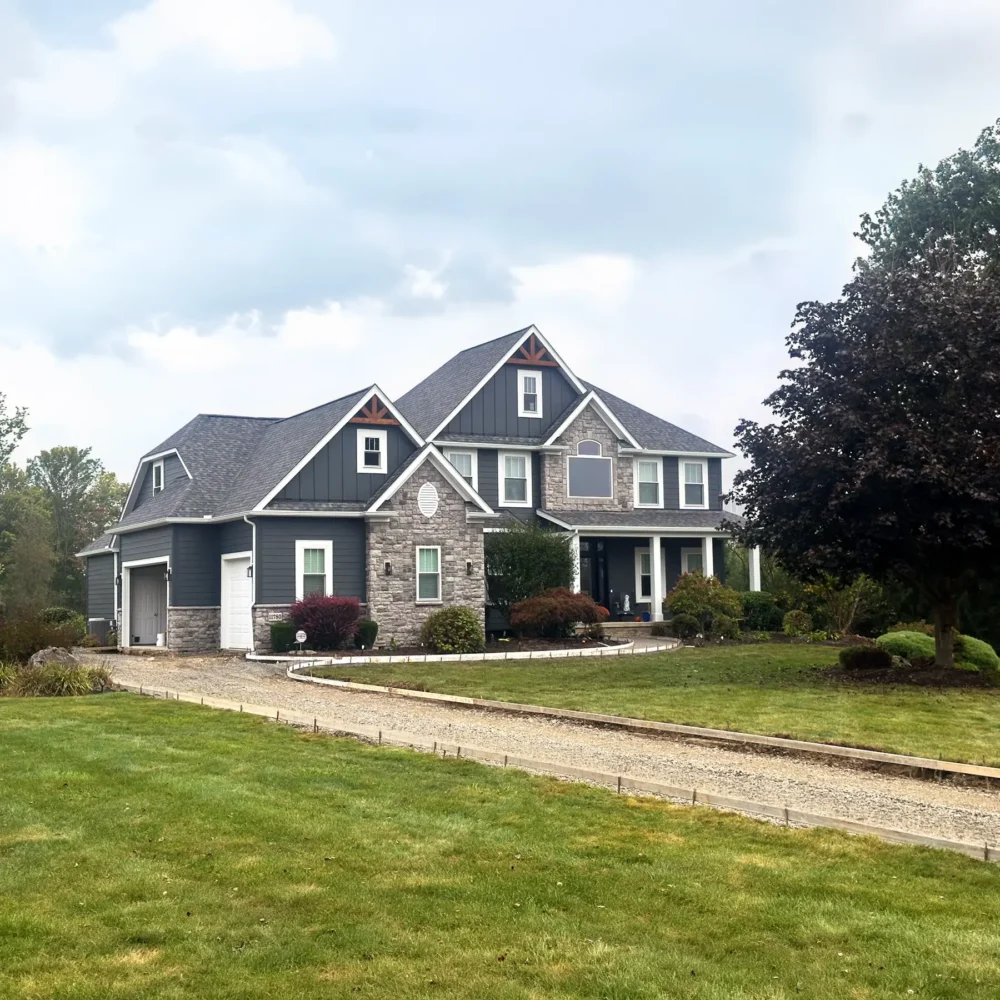 New siding, windows, and entry door in Chagrin Falls Ohio by Biltmore Exteriors