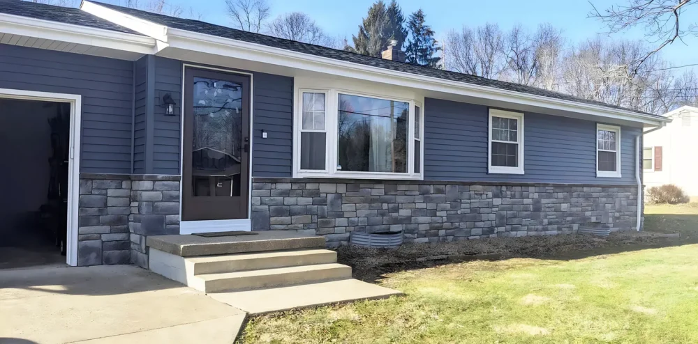 Siding and stonework by Biltmore Exteriors